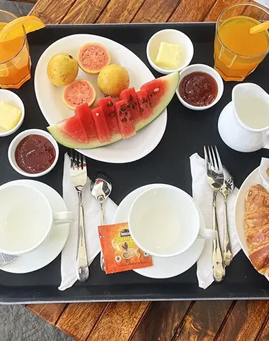 Delicious breakfast tray served at Surya Villa guest house in Auroville