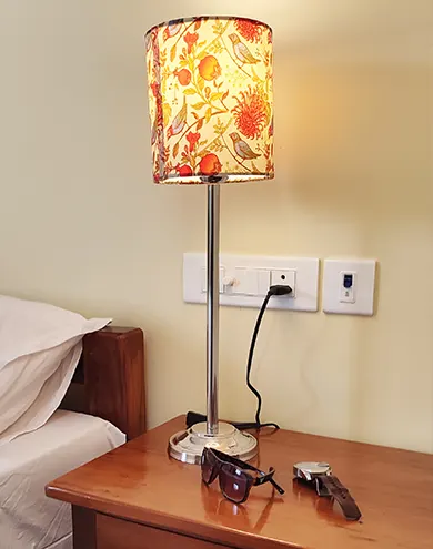 Cozy bedroom corner with warm lighting