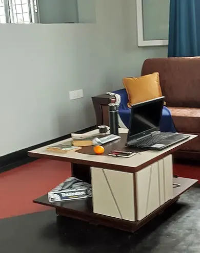 Living room with view of open kitchen